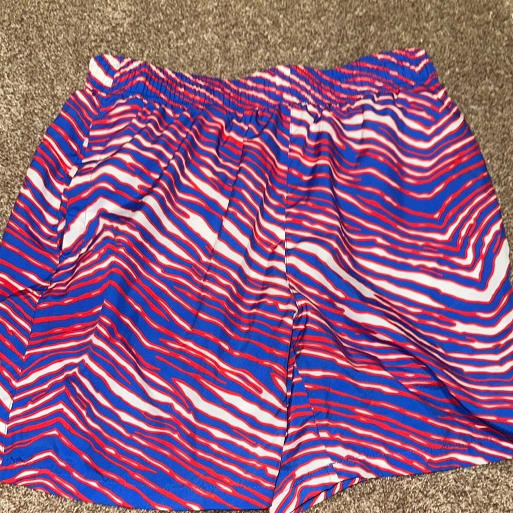 Vibrant Blue and Red men’s swim trunks